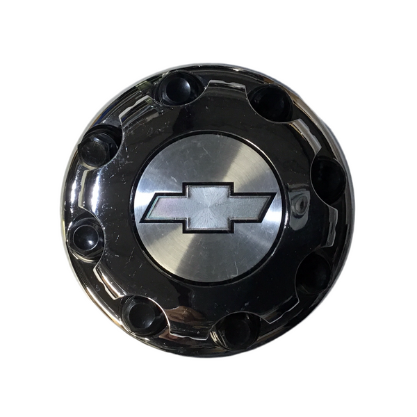 A chrome center hub cap emblem for a 2001-2007 Chevrolet Silverado 3500 Dually model.