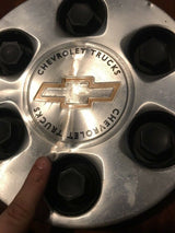 1999-2003 Chevrolet Silverado Tahoe Suburban Silver Wheel Center Cap damaged